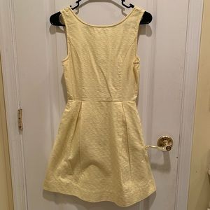 Yellow sleeveless flare dress